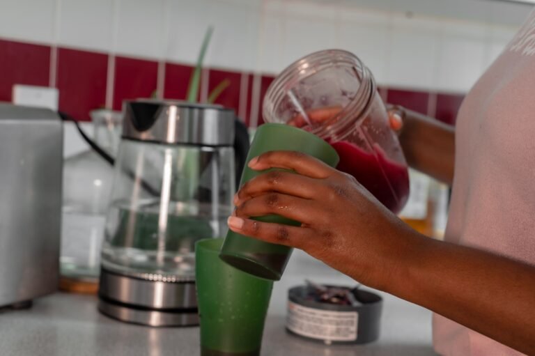 A refreshing glass of fresh berries representing healthy drinks that do not spike blood sugar.